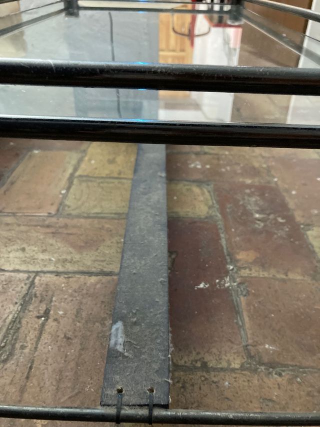 Mesa de centro de cristal y metal