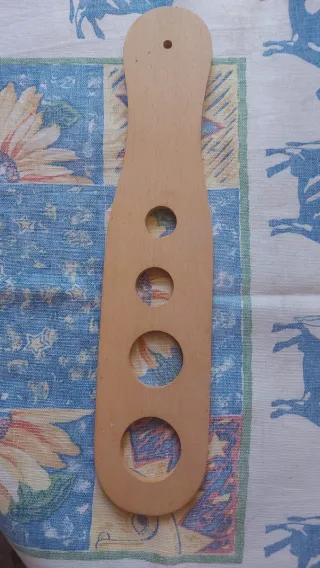 Dosatore di spaghetti in legno.