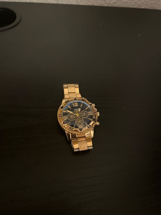 Reloj Dorado y Azul