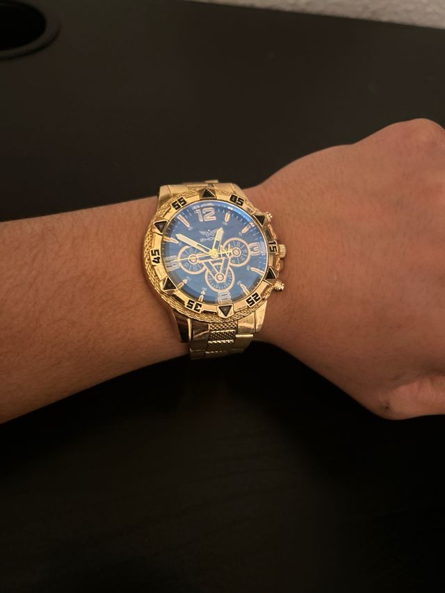 Reloj Dorado y Azul