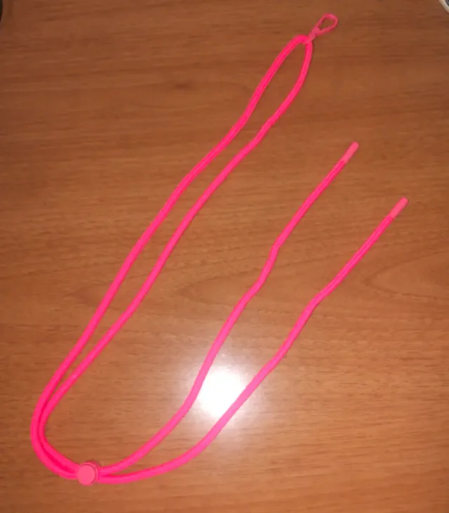 Colgante móvil rosa sin usar.