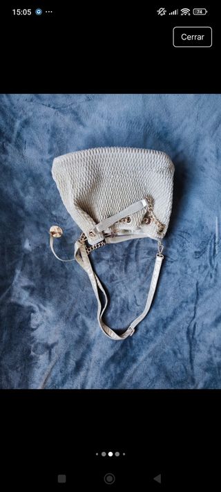 Bolso de mano beige y dorado