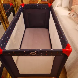 Cuna de viaje estrellas