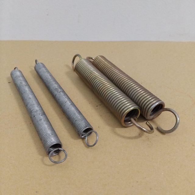 Muelles de tensión acabados plateados y dorados