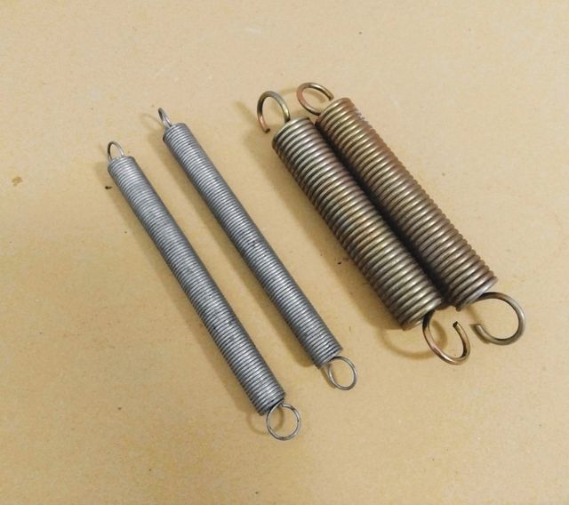 Muelles de tensión acabados plateados y dorados