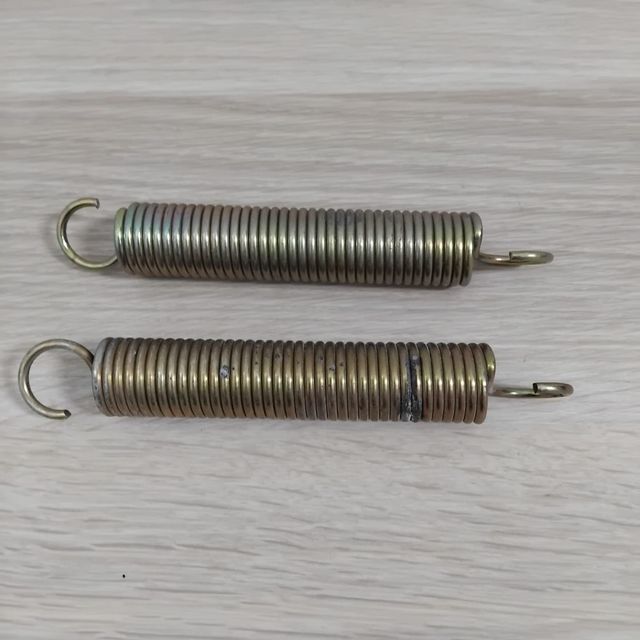 Muelles de tensión acabados plateados y dorados
