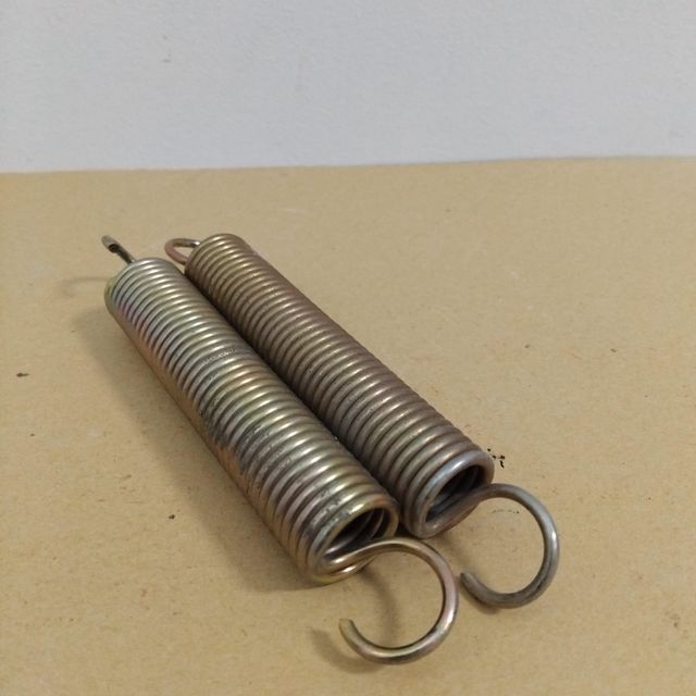 Muelles de tensión acabados plateados y dorados