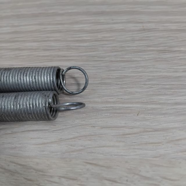 Muelles de tensión acabados plateados y dorados