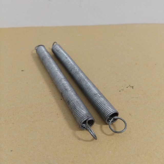 Muelles de tensión acabados plateados y dorados