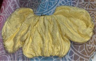 Blusa amarilla manga abullonada