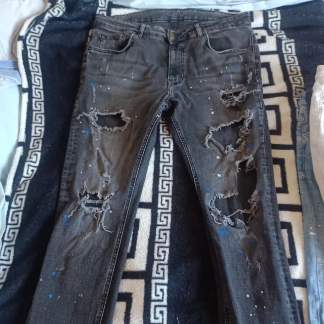 Tejanos chico desgastados y pintados