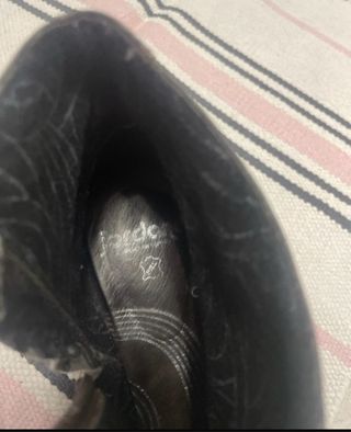 Botines de cuero marrones y negros