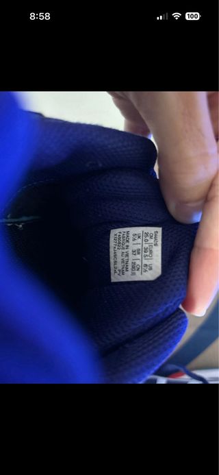 Zapatos de pádel ASICS azules y rojos