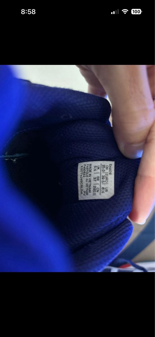 Zapatos de pádel ASICS azules y rojos