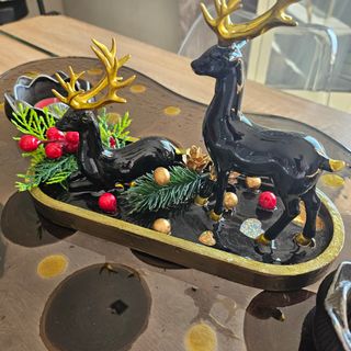 Centro tavola natalizio cervi neri e oro