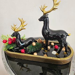 Centro tavola natalizio cervi neri e oro