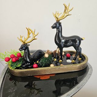 Centro tavola natalizio cervi neri e oro