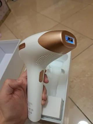 Epilatore Laser Bianco e Oro