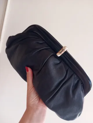 Pochette vintage nera in pelle