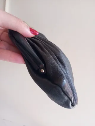 Pochette vintage nera in pelle