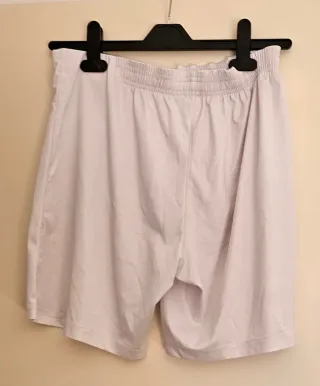 Pantaloncini sportivi bianchi ragazzo. Taglia S