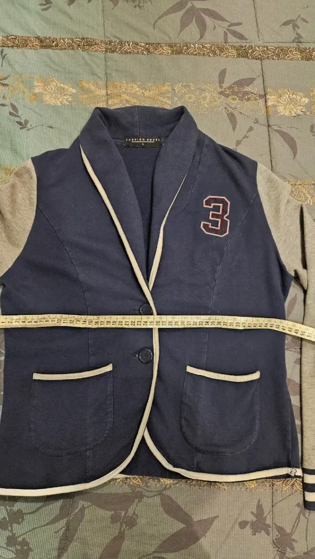 Giacca sportiva blu e grigia da donna