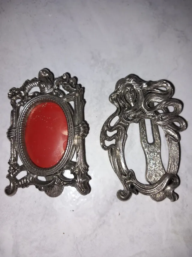 Cornice portafoto antica in metallo argentato