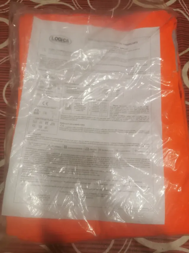 Pantaloni arancioni taglia L