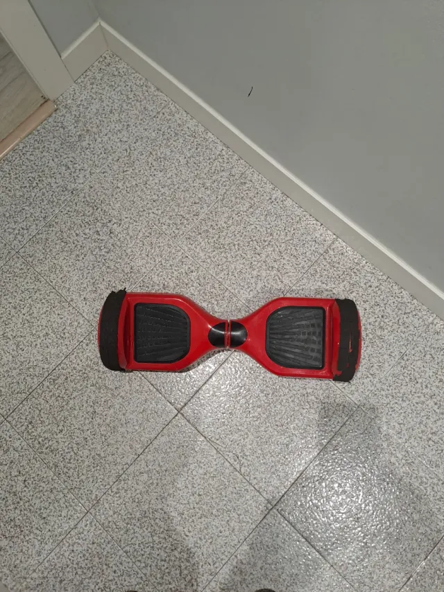 Hoverboard Patín Rojo  Con cargador y estuche.