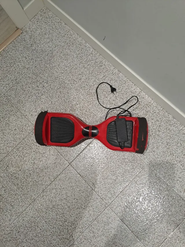 Hoverboard Patín Rojo  Con cargador y estuche.