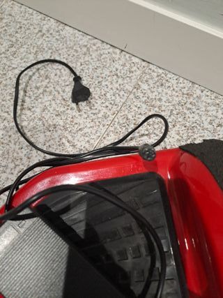 Hoverboard Patín Rojo  Con cargador y estuche.