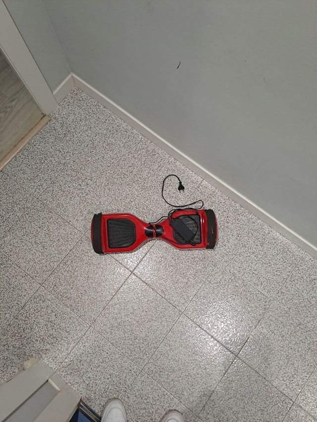 Hoverboard Patín Rojo  Con cargador y estuche.