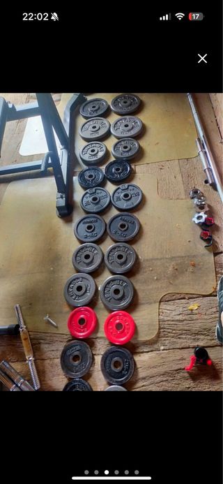 Rack de musculación con pesas