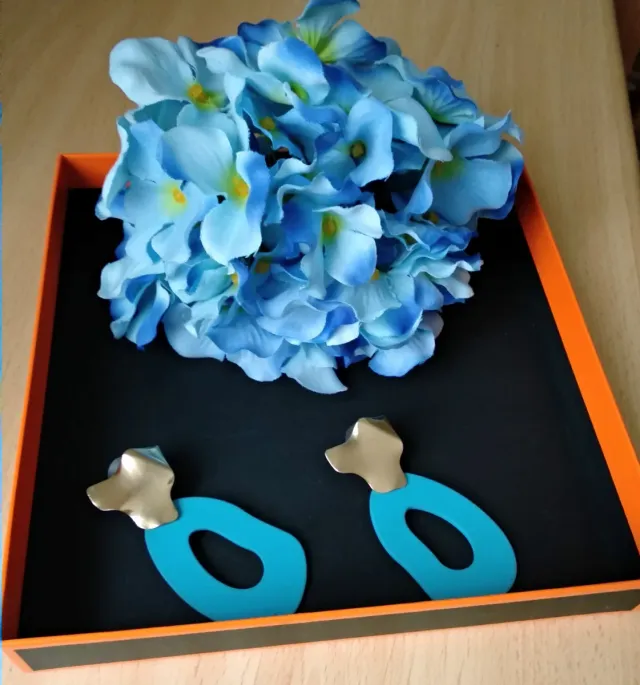 Flor y pendientes flamenca