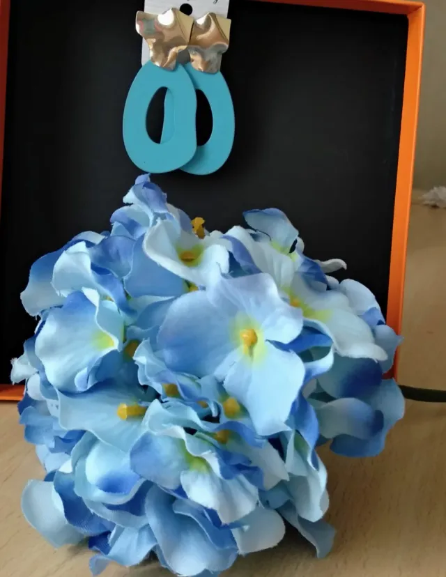 Flor y pendientes flamenca