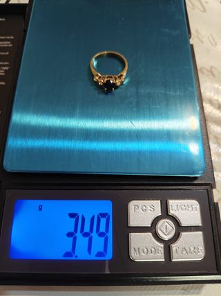 Anello oro giallo con zaffiro centrale