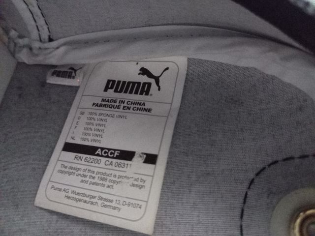 Bolso Puma charol y purpurina negro/dorado