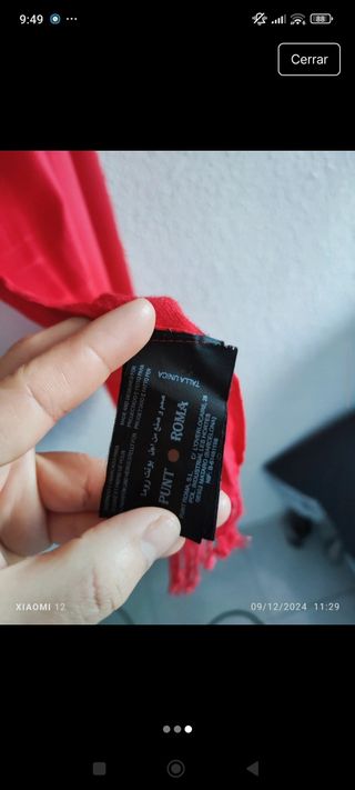 Chal rojo con flecos