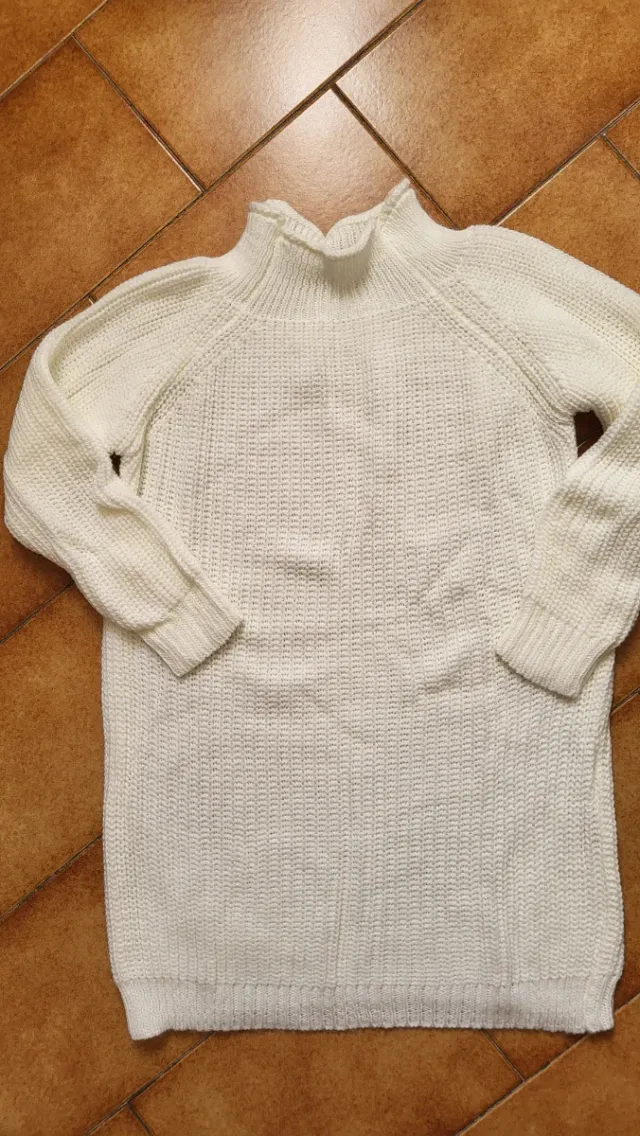 Maglione bianco collo alto
