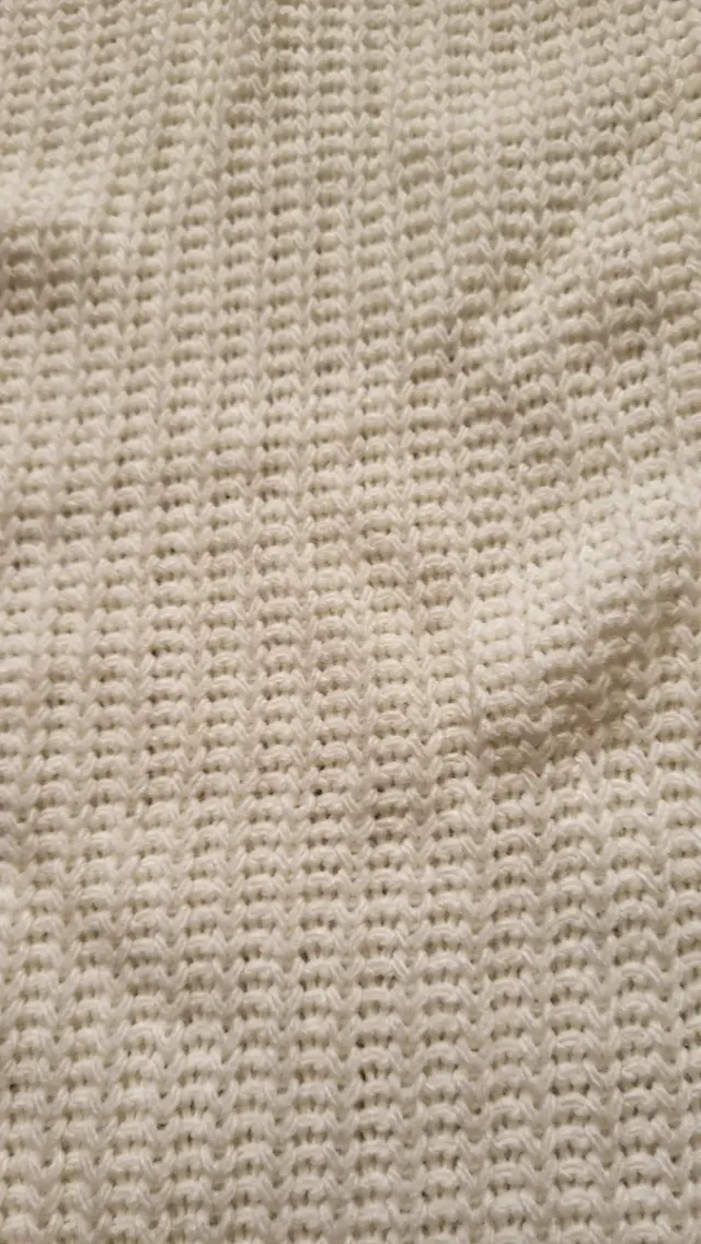 Maglione bianco collo alto