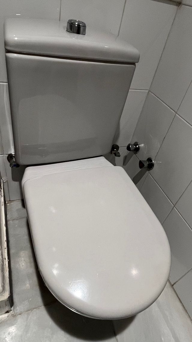 Mueble de baño con lavabo y encimera de mármol