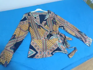Blusa estampada manga larga