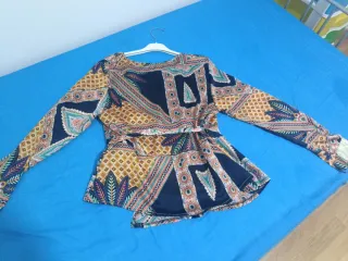 Blusa estampada manga larga