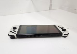 Consola NINTENDO Swtich Oled HEG-001 + 2 Juegos