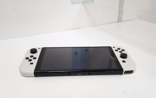 Consola NINTENDO Swtich Oled HEG-001 + 2 Juegos