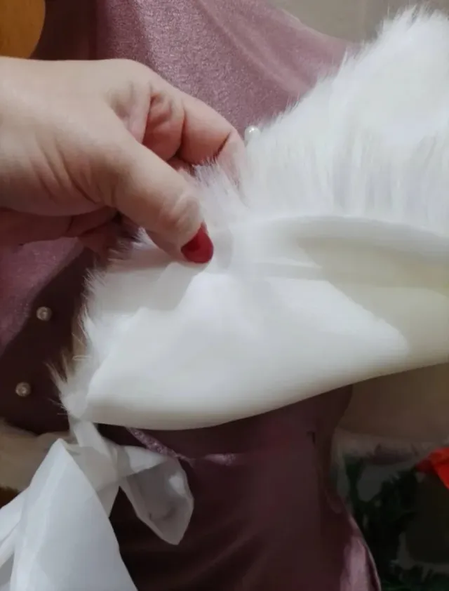 Capas de pelo sintético blanca Lee anuncio