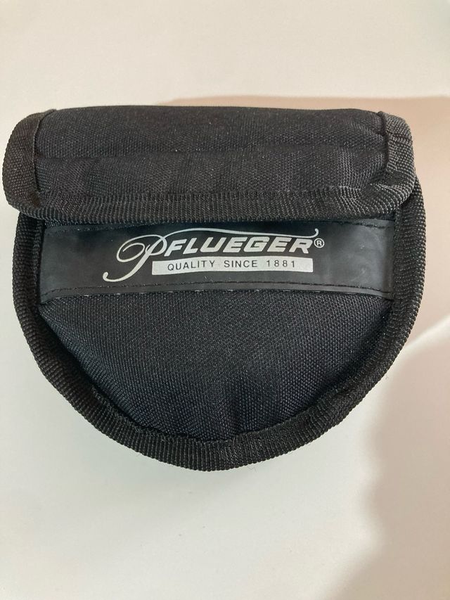 Carrete Pflueger President #10/11 con línea