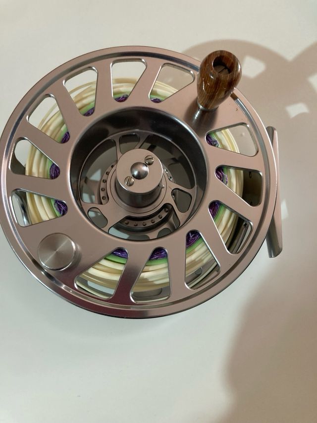 Carrete Pflueger President #10/11 con línea