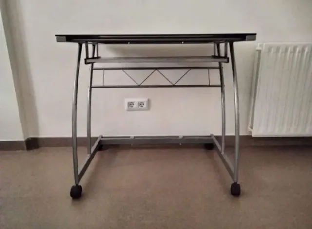 Escritorio cristal negro con ruedas