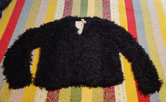 Chaqueta negra peluda mujer